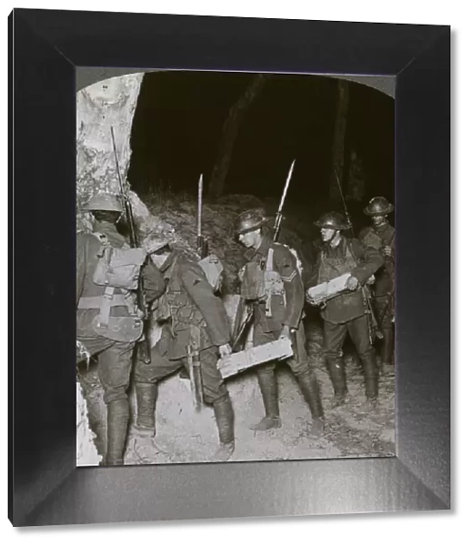 Troops on a night raid leave by a sap for the enemy lines, 20th century. Artist: Realistic Travels Publishers