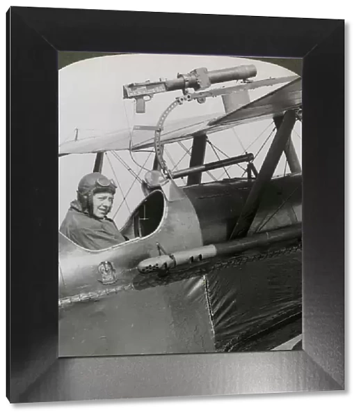 Sopwith Scout with photographic gun mounted on the upper wing, World War I, 1914-1918. Artist: Realistic Travels Publishers