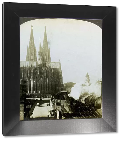 Cologne Cathedral from a railway bridge, Cologne, Germany. Artist: EW Kelley