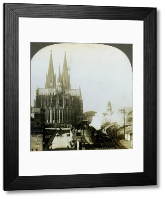 Framed Print : Cologne Cathedral from a railway bridge, Cologne, Germany. Artist: EW Kelley Framed Print : Cologne Cathedral from a railway bridge, Cologne, Germany. Artist: EW Kelley