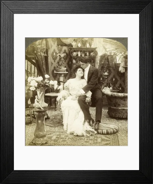 Framed Print : George Greatly Admires Ethels Beautiful Complexion. Artist: Underwood & Underwood Framed Print : George Greatly Admires Ethels Beautiful Complexion. Artist: Underwood & Underwood