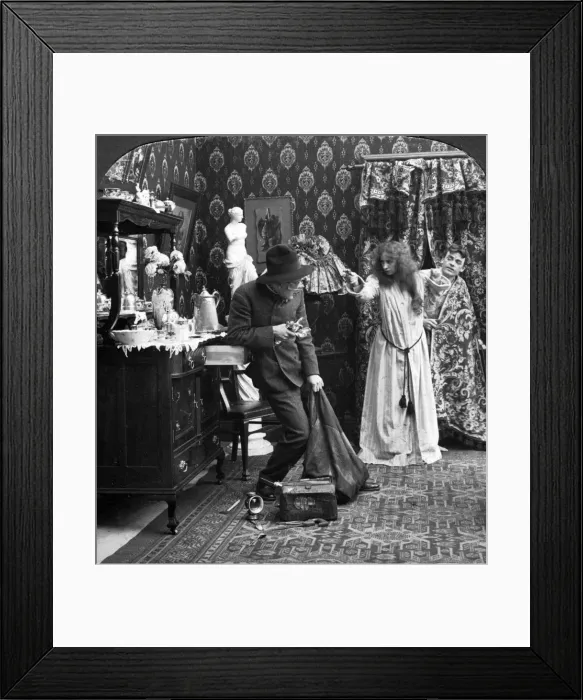 Framed Print : Keep Him Covered Mary, I ll Call the Police. Artist: American Stereoscopic Company Framed Print : Keep Him Covered Mary, I ll Call the Police. Artist: American Stereoscopic Company