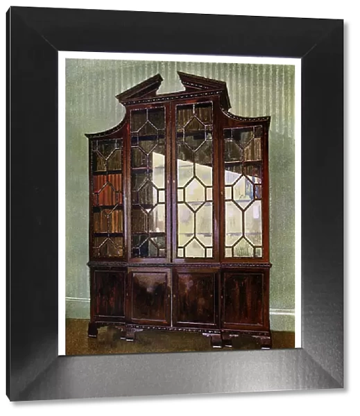 Carved Chippendale library bookcase, 1911-1912. Artist: Edwin Foley