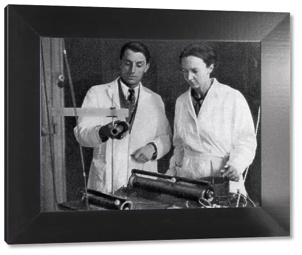 Frederic Joliot and Irene Joliot-Curie, French scientists, 1935