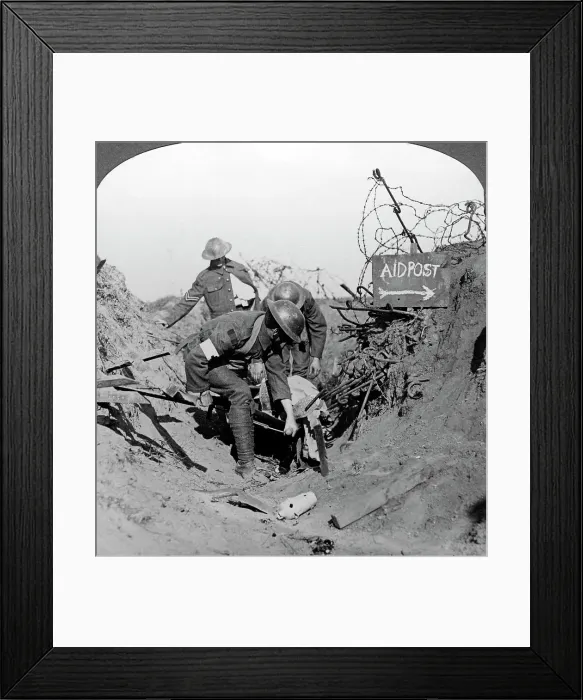 Framed Print : Carrying a wounded soldier to a first aid post, Passchendaele, Belgium, World War I, 1914-1918. Artist: Realistic Travels Publishers Framed Print : Carrying a wounded soldier to a first aid post, Passchendaele, Belgium, World War I, 1914-1918. Artist: Realistic Travels Publishers