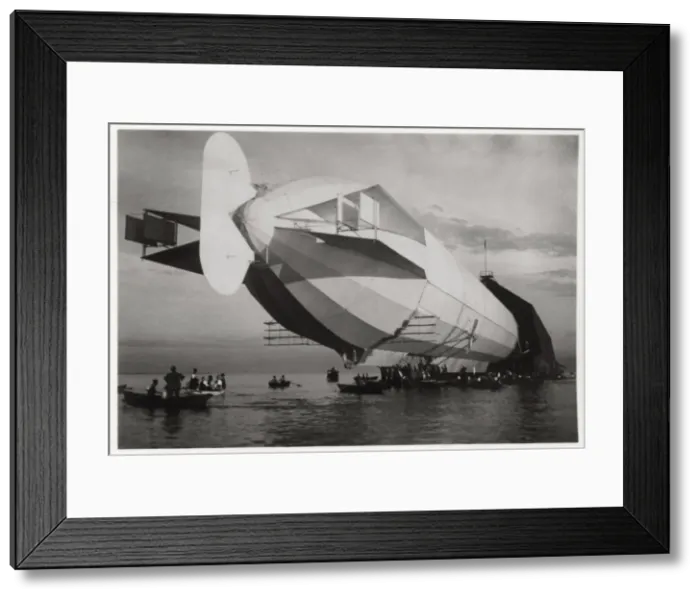 Framed Print : LZ 6 entering a floating hanger, Halle, Germany, c1909-1910 (1933) Framed Print : LZ 6 entering a floating hanger, Halle, Germany, c1909-1910 (1933)