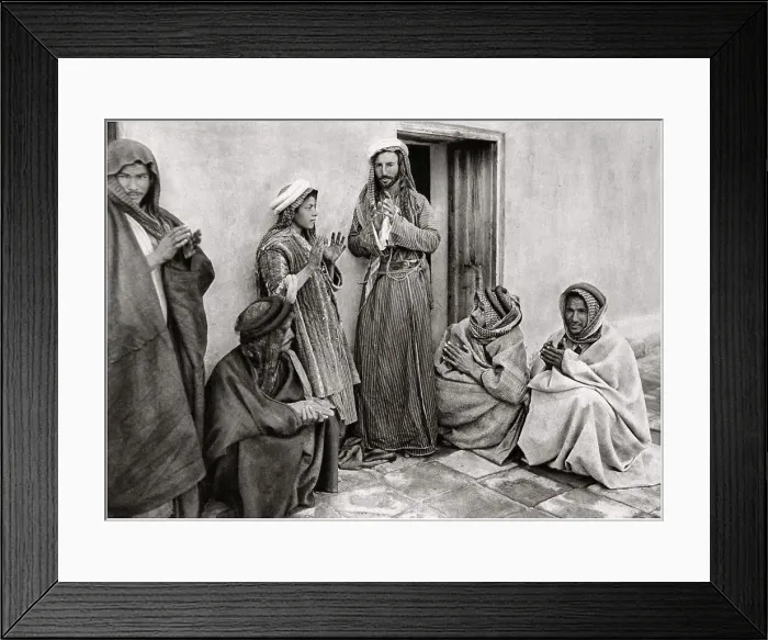 Framed Print : A mullah teaching a prayer to a young man, Iraq, 1925. Artist: A Kerim