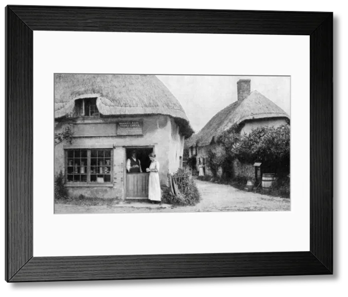 Framed Print : Family grocer, corner of Bradford Peverell, Wessex, c1922 Framed Print : Family grocer, corner of Bradford Peverell, Wessex, c1922