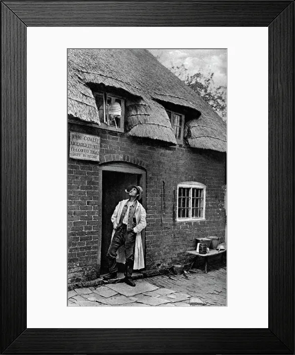 Framed Print : A man smoking a pipe outside a shop, Worcestershire, c1922. Artist: AW Cutler Framed Print : A man smoking a pipe outside a shop, Worcestershire, c1922. Artist: AW Cutler