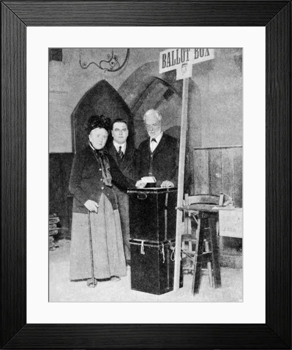 Framed Print : A woman recording her vote at the ballot box, c1922 Framed Print : A woman recording her vote at the ballot box, c1922