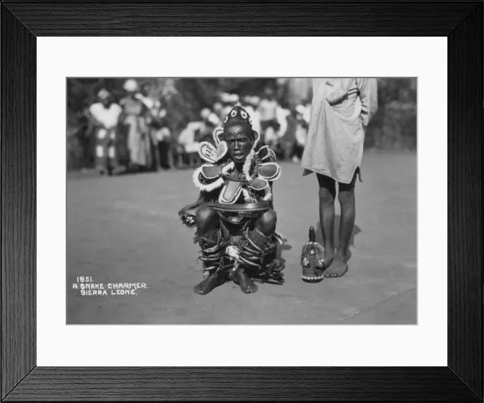 Framed Print : Snake charmer, Sierra Leone, 20th century Framed Print : Snake charmer, Sierra Leone, 20th century