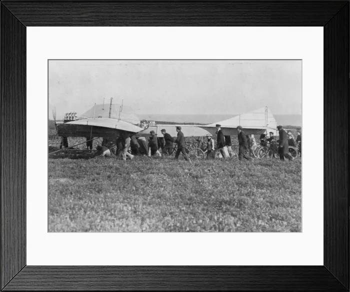 Framed Print : Hubert Latham prepares to take off after Louis Bleriot, near Calais, France, 25 July 1909 Framed Print : Hubert Latham prepares to take off after Louis Bleriot, near Calais, France, 25 July 1909