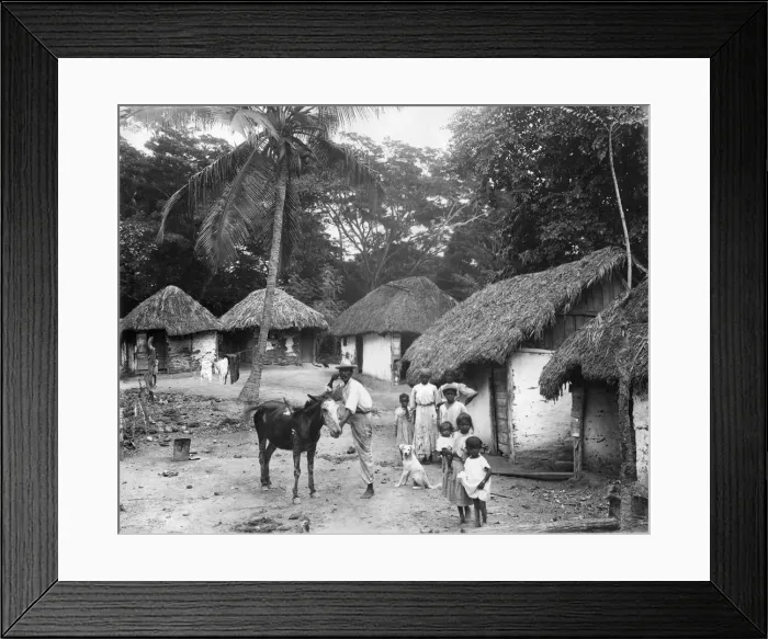 Framed Print : Family outside their home, Coolie Street, Kingston, Jamaica, 1931 Framed Print : Family outside their home, Coolie Street, Kingston, Jamaica, 1931