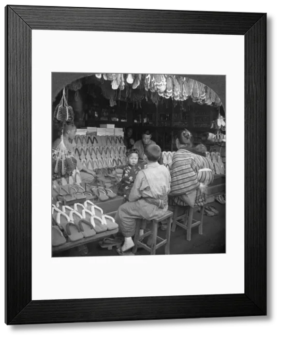Framed Print : Japanese shoe shop, early 20th century. Artist: Keystone View Company Framed Print : Japanese shoe shop, early 20th century. Artist: Keystone View Company