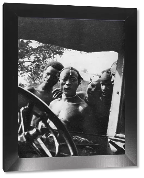 Native men seeing a white woman for the first time, Mongalla to Terrakekka, Sudan, 1925 (1927). Artist: Thomas A Glover
