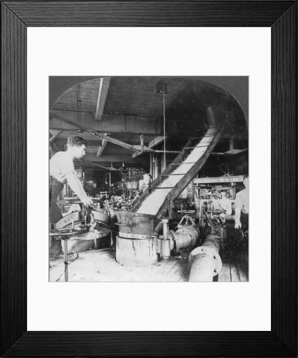 Framed Print : Sugar beet pulp and juice flowing from tank to tank, Montreal, Canada, early 20th century(?). Artist: Keystone View Company Framed Print : Sugar beet pulp and juice flowing from tank to tank, Montreal, Canada, early 20th century(?). Artist: Keystone View Company