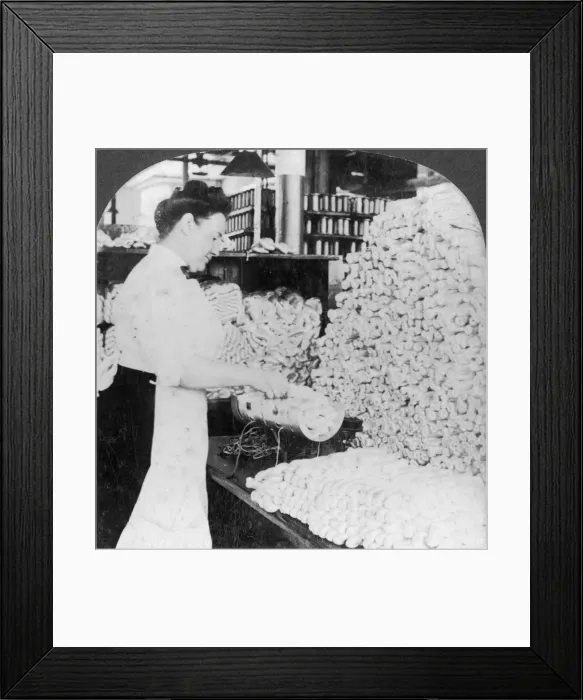 Framed Print : Weighing and sorting raw silk skeins, South Manchester, Connecticut, USA, early 20th century. Artist: Keystone View Company Framed Print : Weighing and sorting raw silk skeins, South Manchester, Connecticut, USA, early 20th century. Artist: Keystone View Company