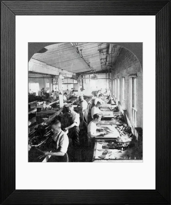 Framed Print : Workers cutting leather for shoes in a factory, Lynn, Massachusetts, USA, 20th century. Artist: Keystone View Company Framed Print : Workers cutting leather for shoes in a factory, Lynn, Massachusetts, USA, 20th century. Artist: Keystone View Company