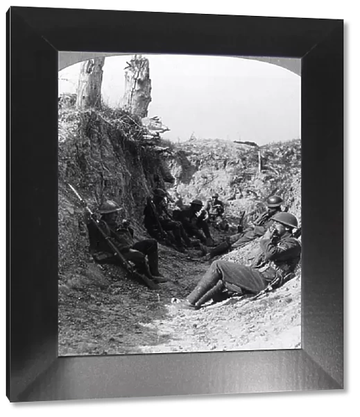 Troops waiting in a trench near Arras, France, World War I, c1914-c1918. Artist: Realistic Travels Publishers