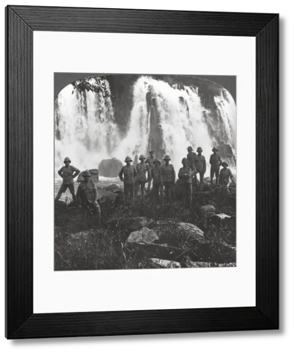 Framed Print : British troops refreshing themselves at a waterfall, Africa, World War I, c1914-c1918. Artist: Realistic Travels Publishers Framed Print : British troops refreshing themselves at a waterfall, Africa, World War I, c1914-c1918. Artist: Realistic Travels Publishers
