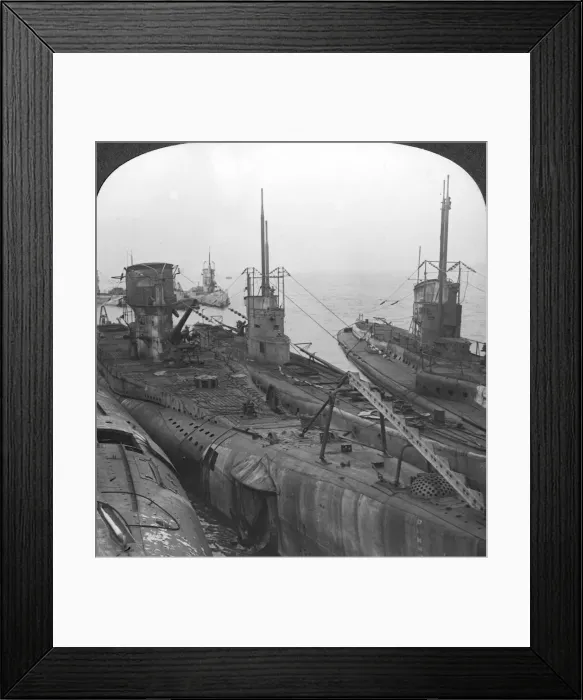 Framed Print : German submarines secured in a Channel port, c1918-c1919. Artist: Realistic Travels Publishers Framed Print : German submarines secured in a Channel port, c1918-c1919. Artist: Realistic Travels Publishers