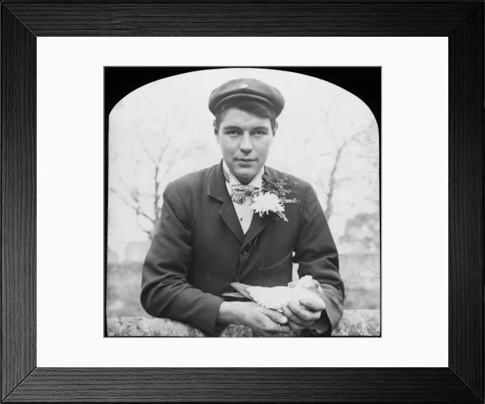 Framed Print : E Hack holding a pigeon, late 19th or early 20th century Framed Print : E Hack holding a pigeon, late 19th or early 20th century