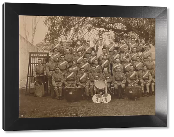 The Battalion Band of the First Battalion, The Queens Own Royal West Kent Regiment. Poona, India, 1