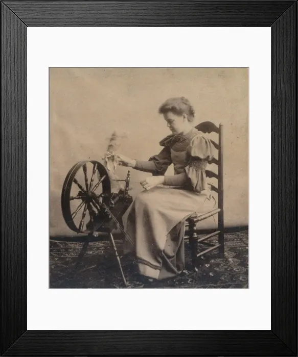 Framed Print : A lady at a spinning wheel c1900 Framed Print : A lady at a spinning wheel c1900