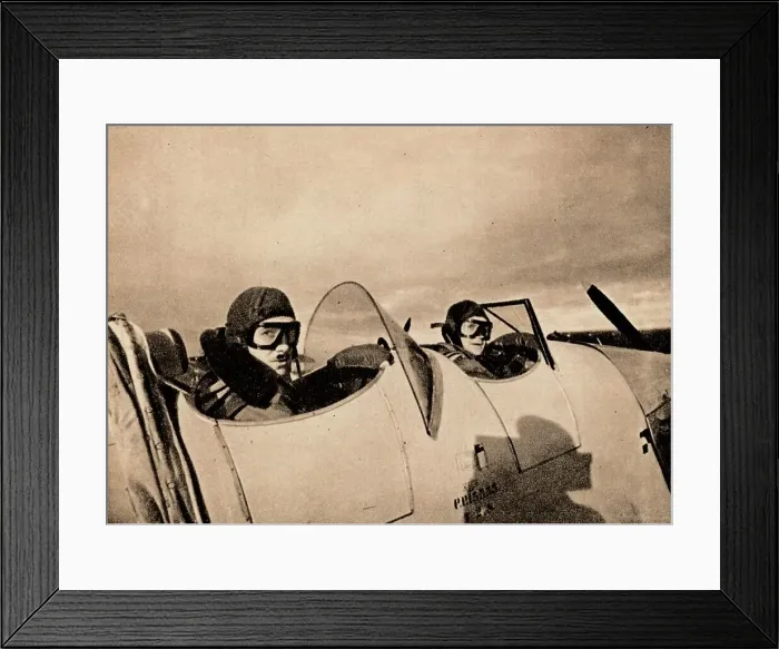 Framed Print : Starting on an instructional flight in a Miles Magister. The pupil is in the rear cockpit, 1940 Framed Print : Starting on an instructional flight in a Miles Magister. The pupil is in the rear cockpit, 1940
