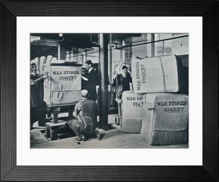 Framed Print : Packing the bales of khaki for despatch to the Government, c1914 Framed Print : Packing the bales of khaki for despatch to the Government, c1914