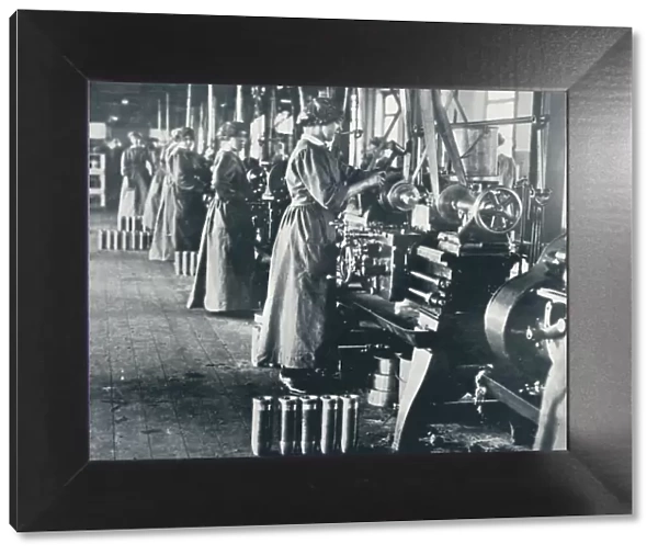 Girl munition workers at their lathes in a Scottish mill, c1914