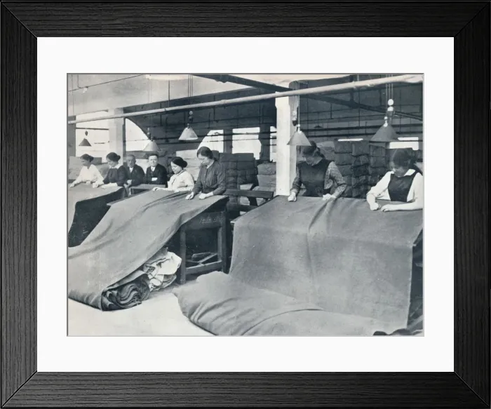 Framed Print : The Making of khaki: examining the finished cloth, c1914 Framed Print : The Making of khaki: examining the finished cloth, c1914