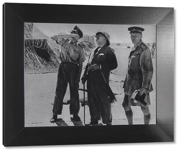 Mr. Churchill with Sir A. Tedder and Gen. Auchinleck. 1942