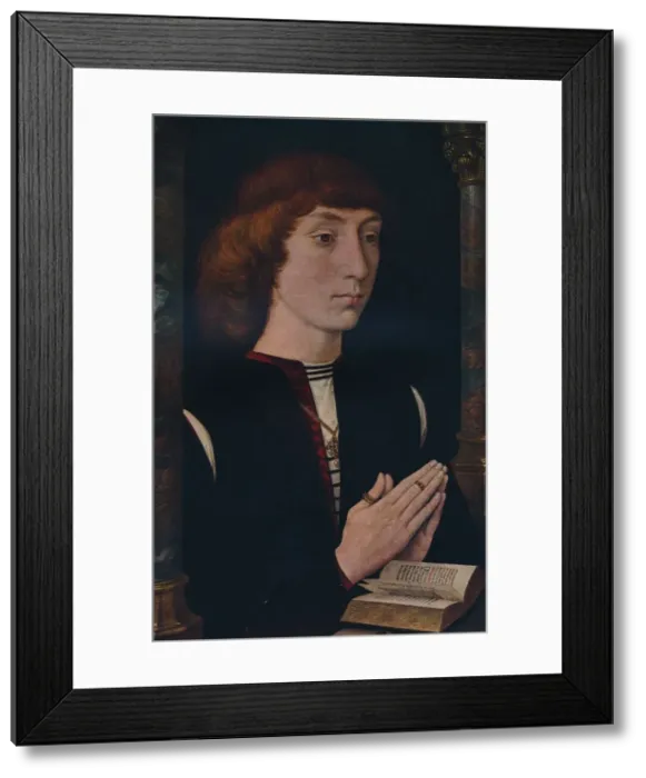Framed Print : A Young Man at Prayer, c1475. Artists: Cecil Reginald Grundy, Hans Memling Framed Print : A Young Man at Prayer, c1475. Artists: Cecil Reginald Grundy, Hans Memling