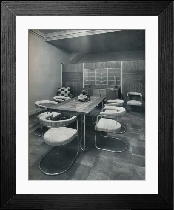 Framed Print : A dining-room suite, with table and chairs of steel tube. By Practical Equipment Ltd. of London Framed Print : A dining-room suite, with table and chairs of steel tube. By Practical Equipment Ltd. of London