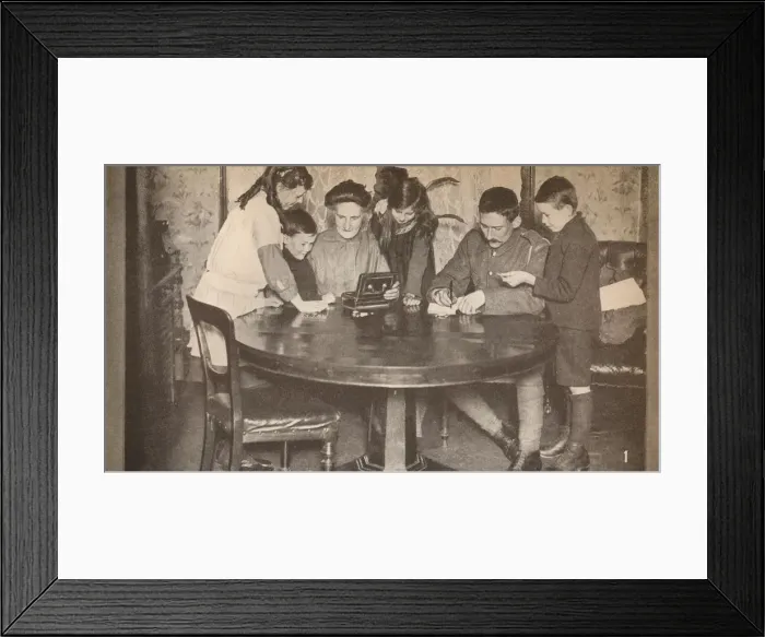 Framed Print : Children emptying their money-boxes to invest in war loan, c1917, (1935) Framed Print : Children emptying their money-boxes to invest in war loan, c1917, (1935)