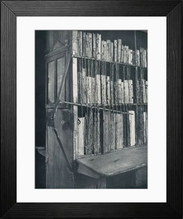 Framed Print : Bookcase, 15th century, with some later editions, and catalogue frame, 17th century, c1931