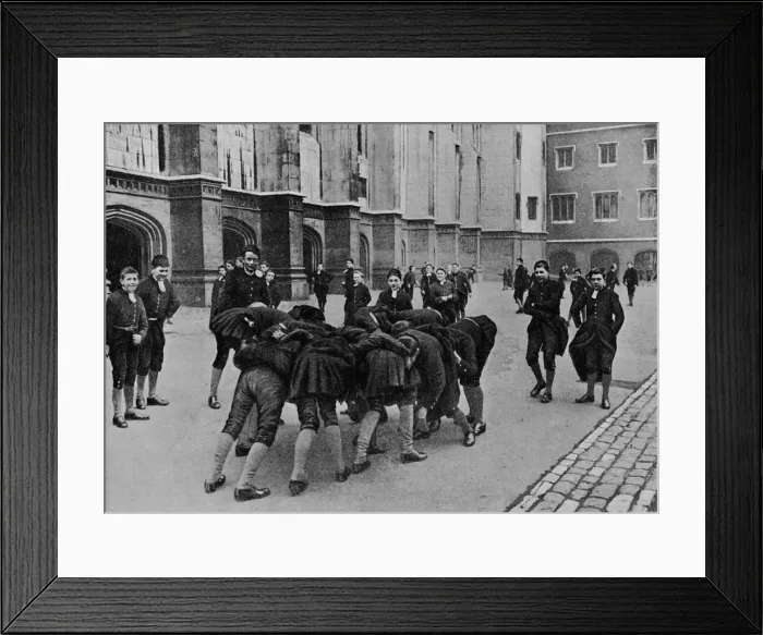Framed Print : An exciting game: pupils of Christs Hospital school, City of London, c1900 (1911). Artist: RW Thomas Framed Print : An exciting game: pupils of Christs Hospital school, City of London, c1900 (1911). Artist: RW Thomas