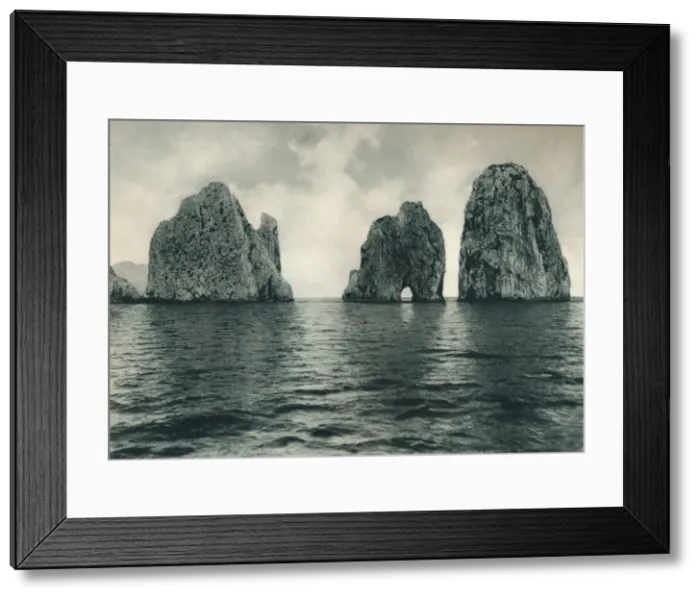 Framed Print : The Faraglioni, Capri, Italy, 1927. Artist: Eugen Poppel Framed Print : The Faraglioni, Capri, Italy, 1927. Artist: Eugen Poppel