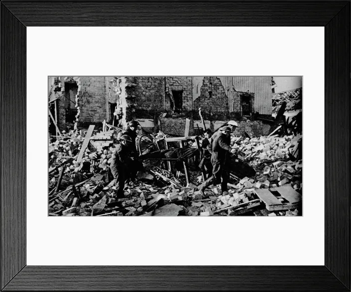 Framed Print : South Wales had its turn early in the New Year. A stretcher party carries a casualty to safety, 19 Framed Print : South Wales had its turn early in the New Year. A stretcher party carries a casualty to safety, 19