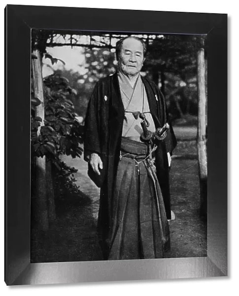 Viscount Shibusawa, (1840-1931) wearing his samurai swords, c1900, (1921). Artist: Julian Leonard Street