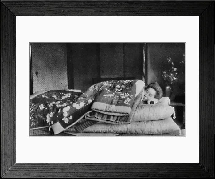 Framed Print : Saki, the housekeeper sleeps on a mattress with hard pillow under a quilted kimono, c1900, (1921). Artist: Julian Leonard Street Framed Print : Saki, the housekeeper sleeps on a mattress with hard pillow under a quilted kimono, c1900, (1921). Artist: Julian Leonard Street