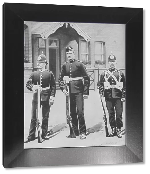 Corporal and Privates, the Buffs, c1880. Artist: Gregory & Co