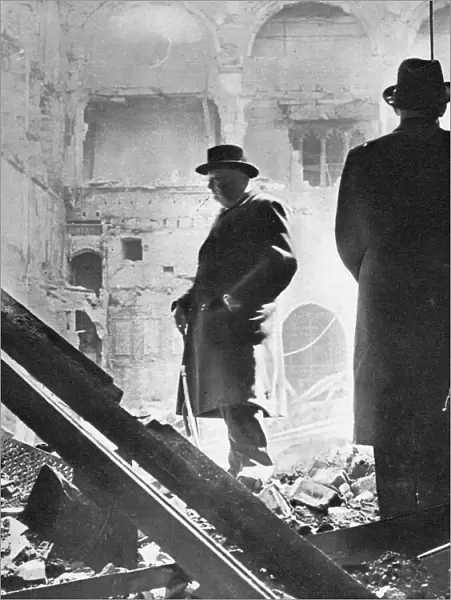 Mr. Churchill contemplates the ruins of the House of Commons, bombed in May 1941, 1941