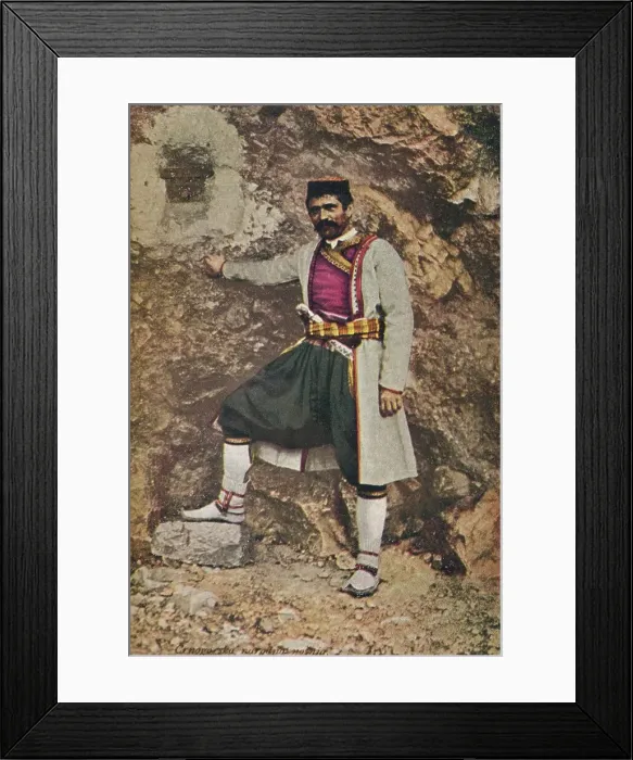Framed Print : A Montenegrin in Holiday Costume, c1913. Artist: Charles JS Makin Framed Print : A Montenegrin in Holiday Costume, c1913. Artist: Charles JS Makin
