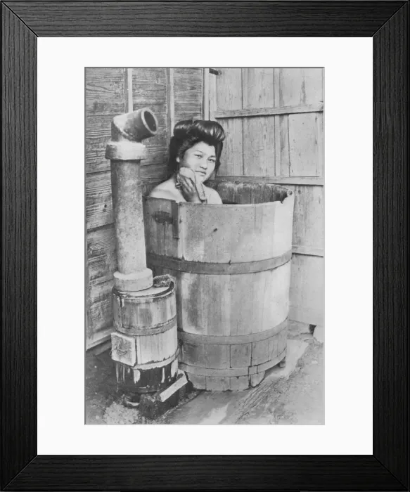 Framed Print : The bath is a large barrel with charcoal stove. Frequently out of doors, c1900, (1921). Artist: Julian Leonard Street Framed Print : The bath is a large barrel with charcoal stove. Frequently out of doors, c1900, (1921). Artist: Julian Leonard Street