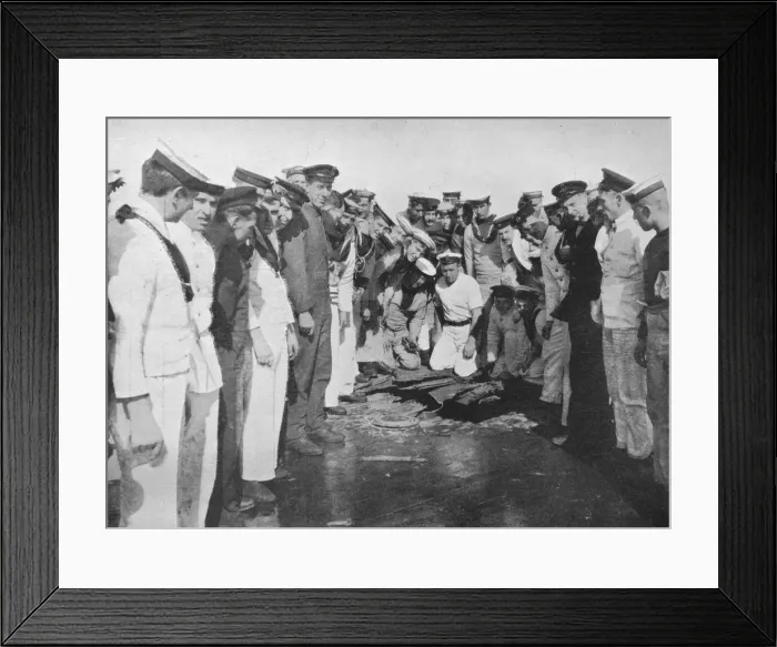 Framed Print : British sailors round a hole in the deck of their vessel, 1915 Framed Print : British sailors round a hole in the deck of their vessel, 1915