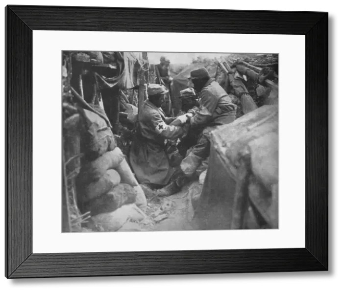 Framed Print : First aid to a wounded man in one of the French trenches, 1915 Framed Print : First aid to a wounded man in one of the French trenches, 1915