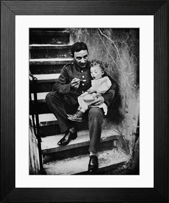 Framed Print : One of the New Army making himself useful in his billet, 1915 Framed Print : One of the New Army making himself useful in his billet, 1915
