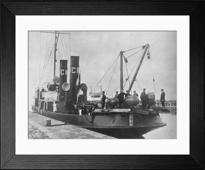 Framed Print : A German mine layer leaving port with her mines ready on deck, 1914